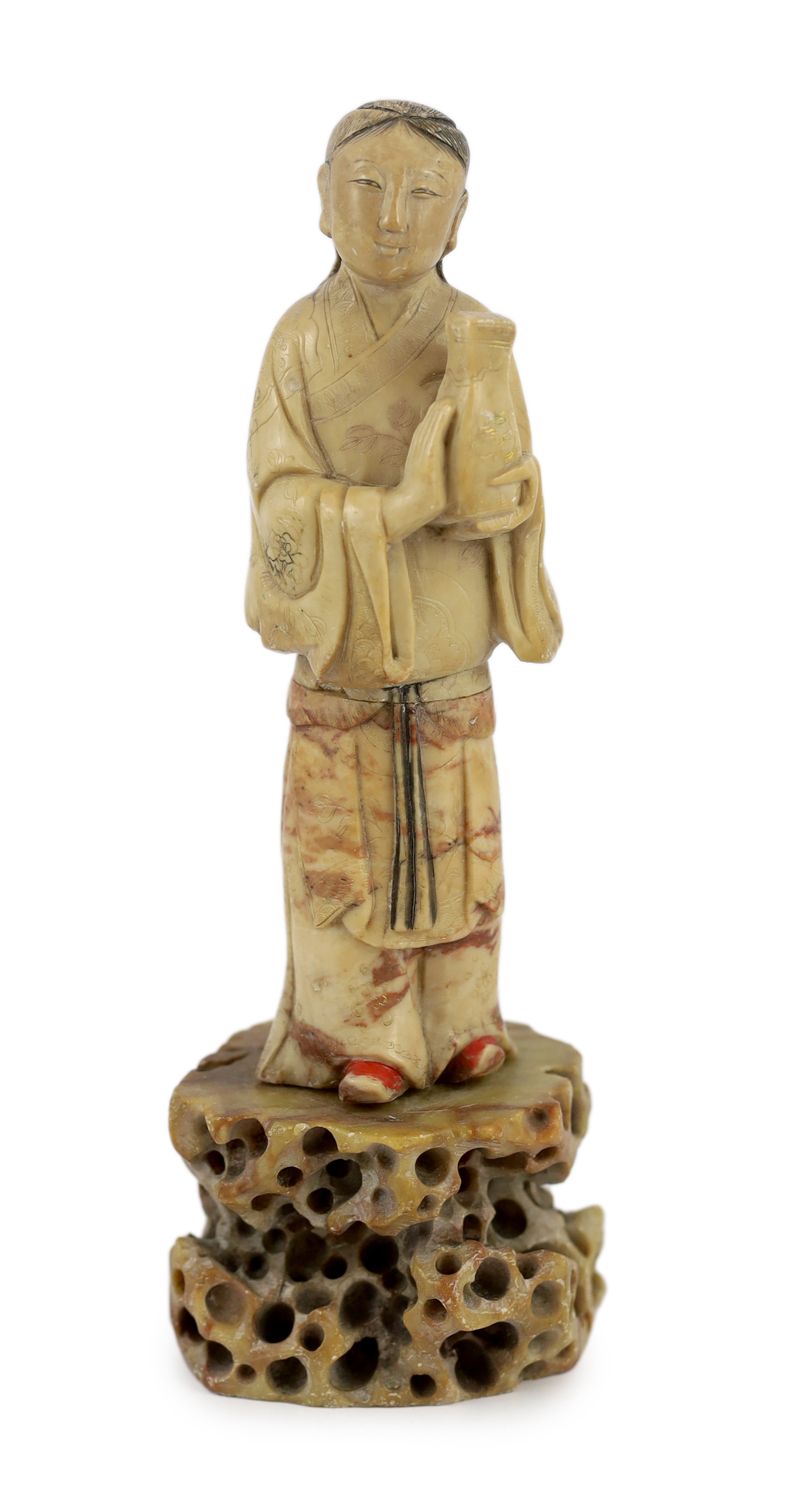 A Chinese soapstone figure of an attendant, 18th century, minor repairs